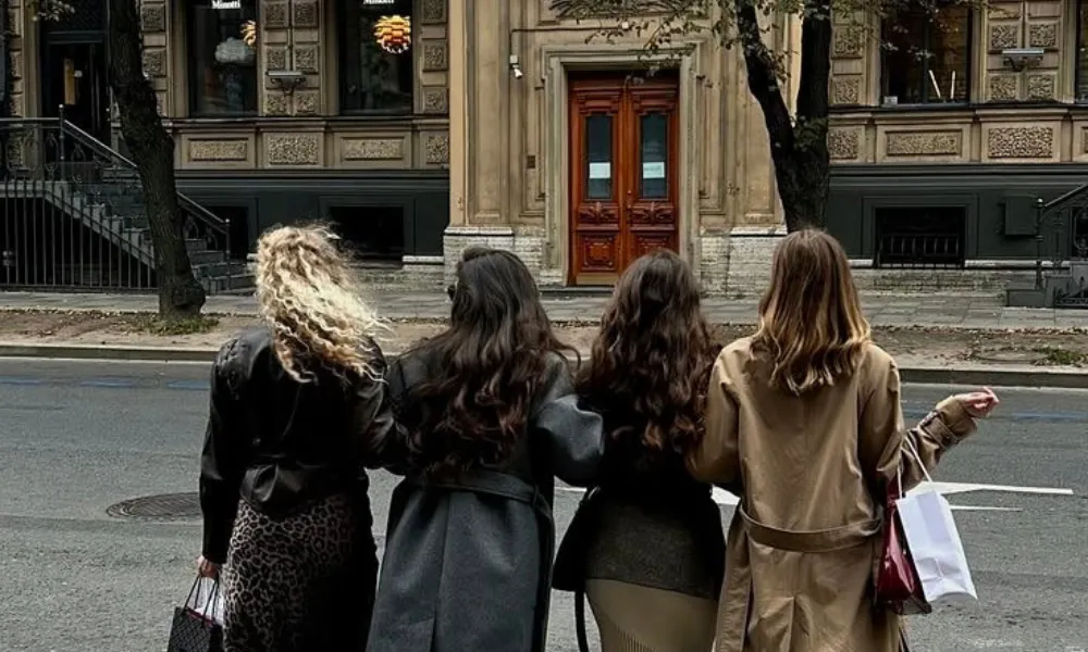 Stylish group of female friends on a shopping outing for Funny Names for Group Chats.