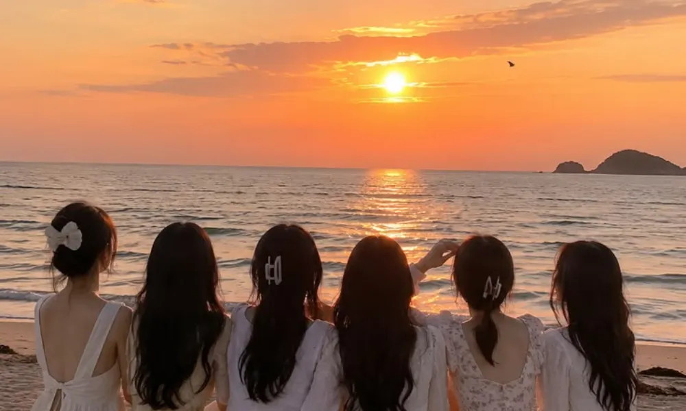  Best friends gathered on the beach during a golden sunset for Funny Names for Group Chats.